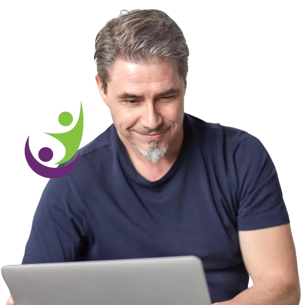 Happy man using laptop to make an NDIS referral