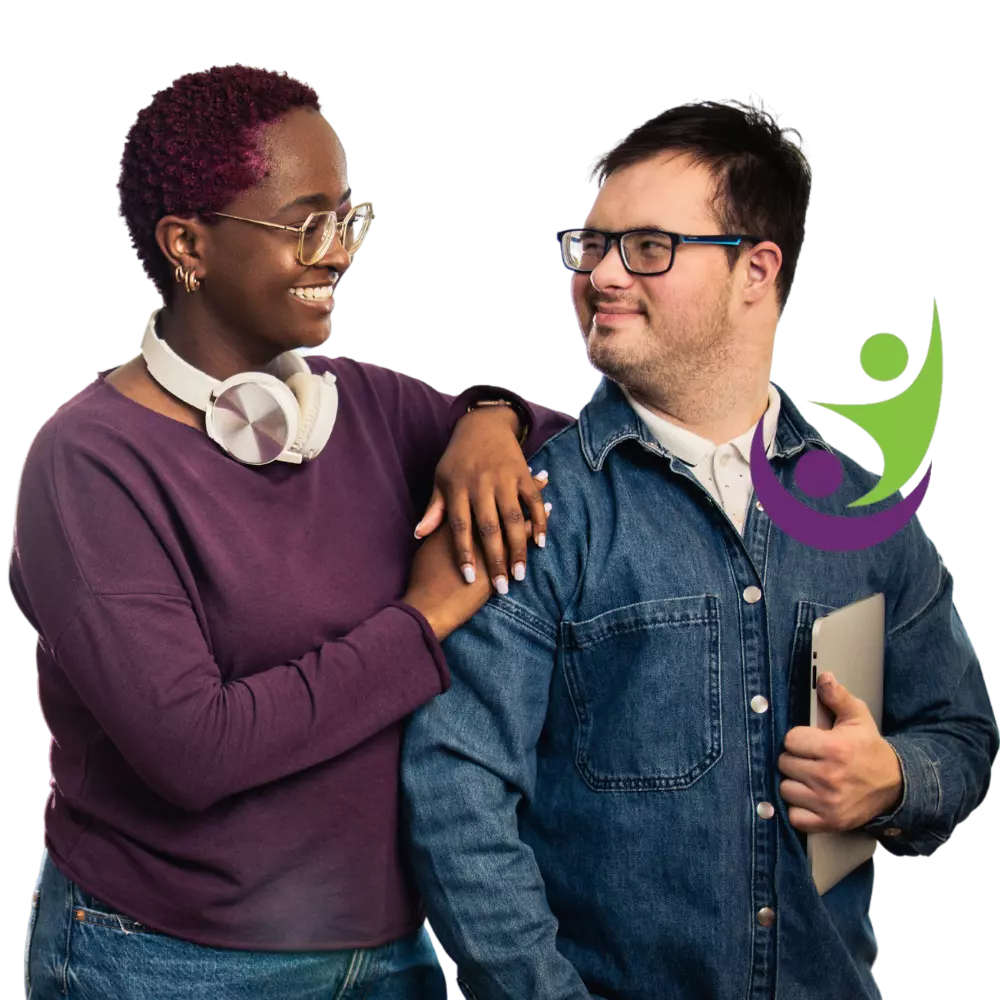 Disabled man with down syndrome smiling with support worker